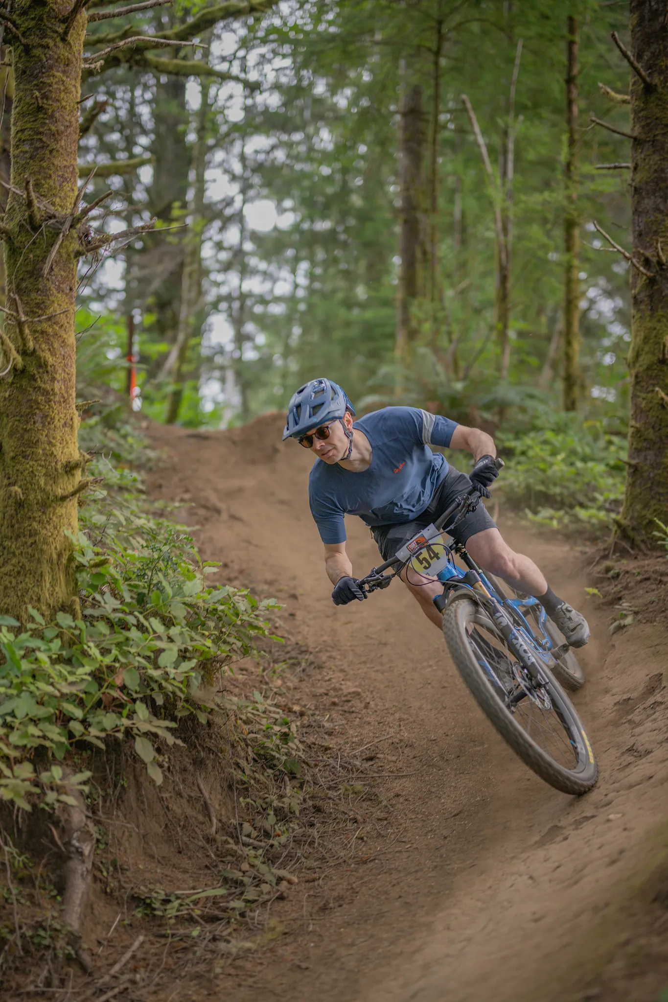 Mountain biker on a technical descent